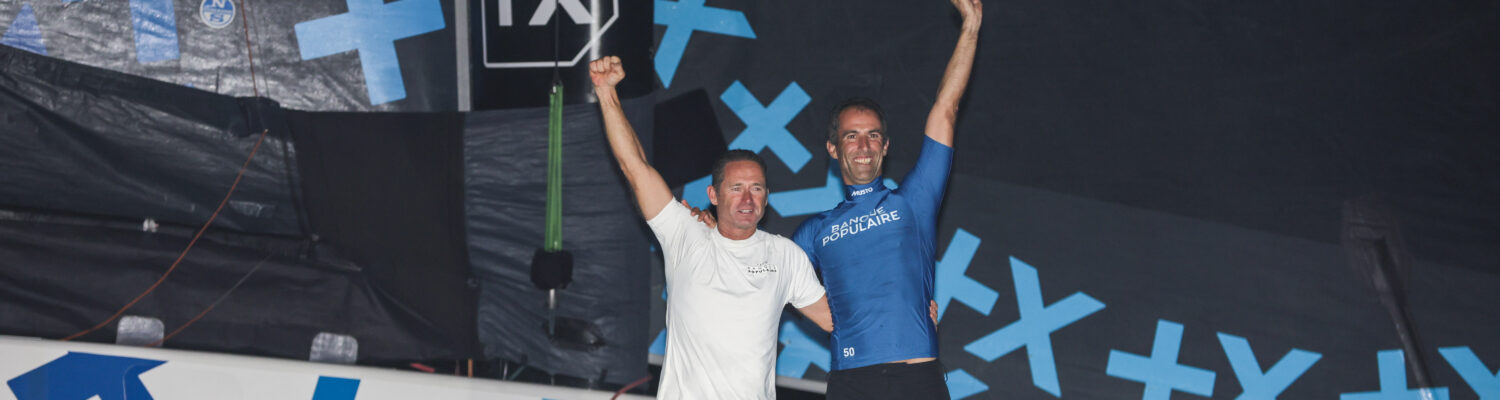 FORT DE FRANCE, MARTINIQUE - NOVEMBER 12 : Ultim category winner Banque Populaire XI, skippers Armel Le Cleac'h and Sebastien Josse, after 14j 10h 14mn 50sec, is pictured during arrivals of the Transat Jacques Vabre in Fort de France, Martinique, on November 12, 2023. (photo by Jean-Marie Liot / Alea)