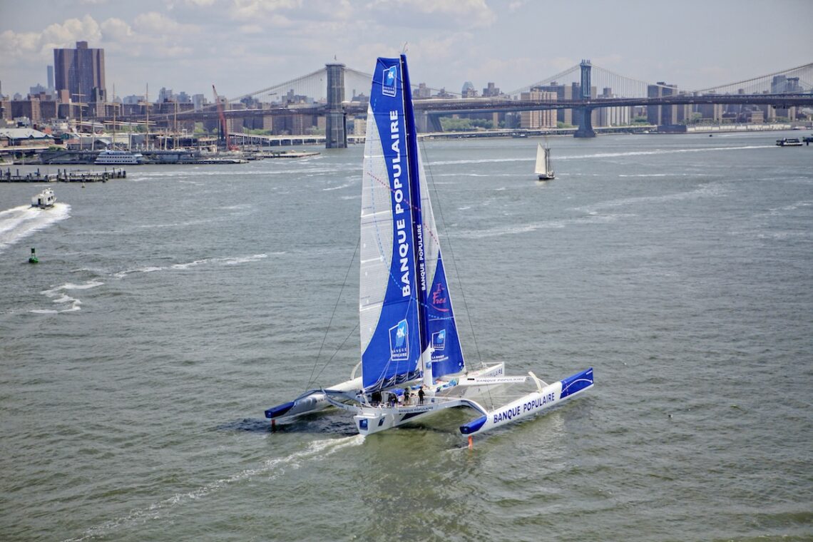 Armel Le Cléac'h and the Maxi Trimaran Solo Banque Populaire VII on stand by for the multihull North Atlantic solo record attempt, New York, Manhattan, United States of America.