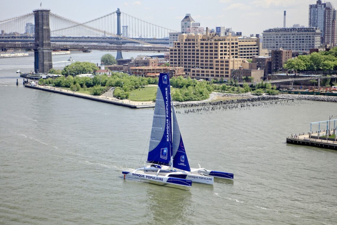 Armel Le Cléac'h and the Maxi Trimaran Solo Banque Populaire VII on stand by for the multihull North Atlantic solo record attempt, New York, Manhattan, United States of America.